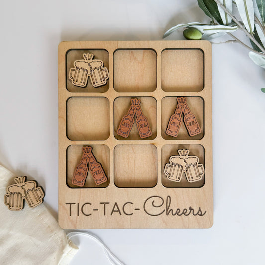 a wooden tic tac - tac - chees game with wooden pieces