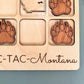 a picture of a bear paw magnet with the state of montana on it