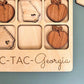 a wooden puzzle with a state of georgia surrounded by wooden cutouts