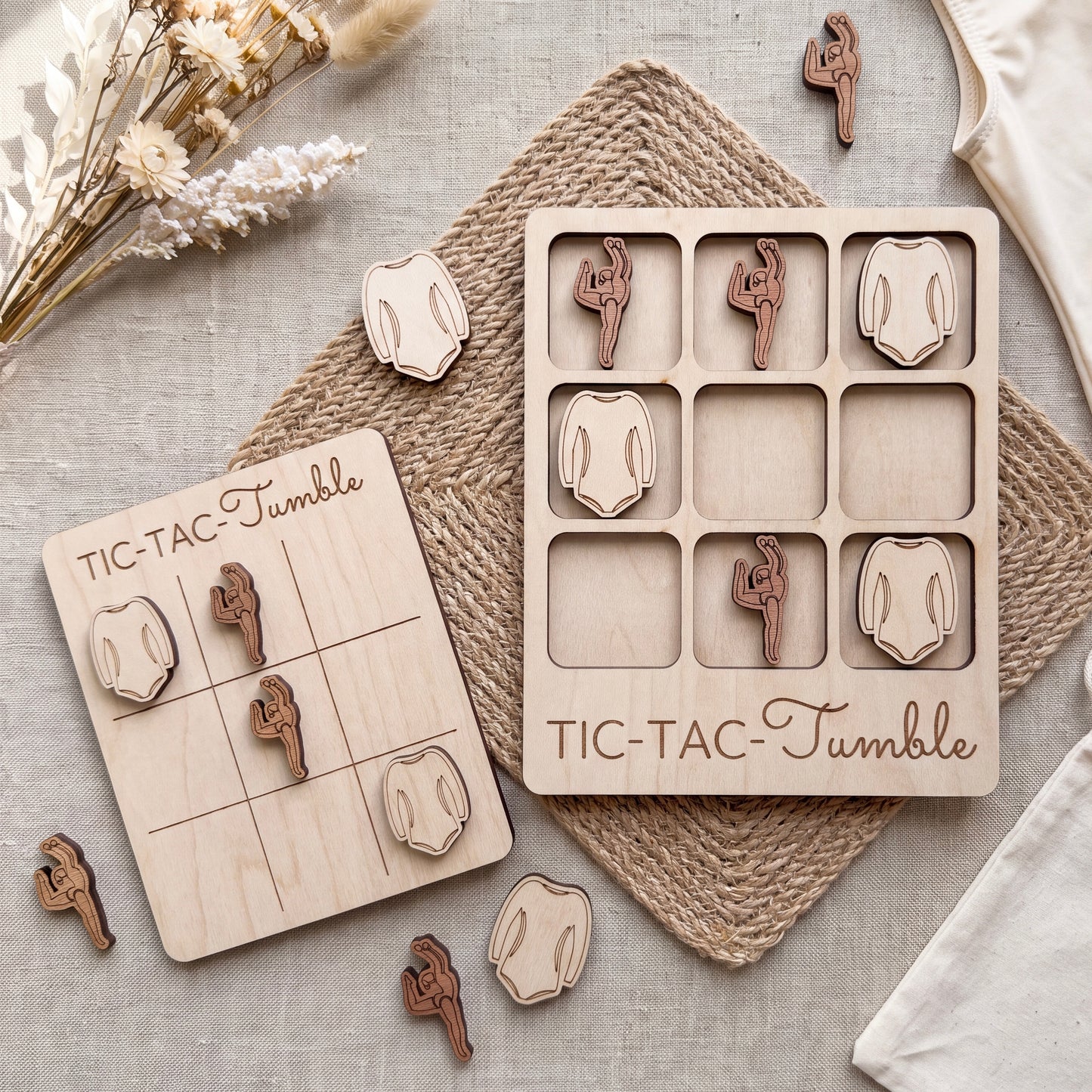 a wooden tic-tac game with wooden pieces and a wooden board, along with some additional wooden pieces and a woven mat.