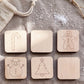 a collection of six wooden coaster-shaped objects, each with a different holiday-themed design. The coasters include a candy cane, a gingerbread man, a snowman, a Christmas tree, a snowman, and a snowman.