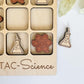 a set of wooden magnets with a science theme