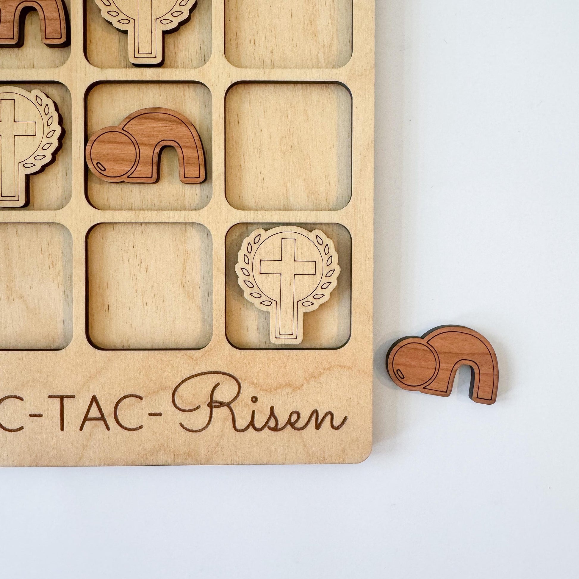 a wooden puzzle with a wooden elephant and other wooden animals