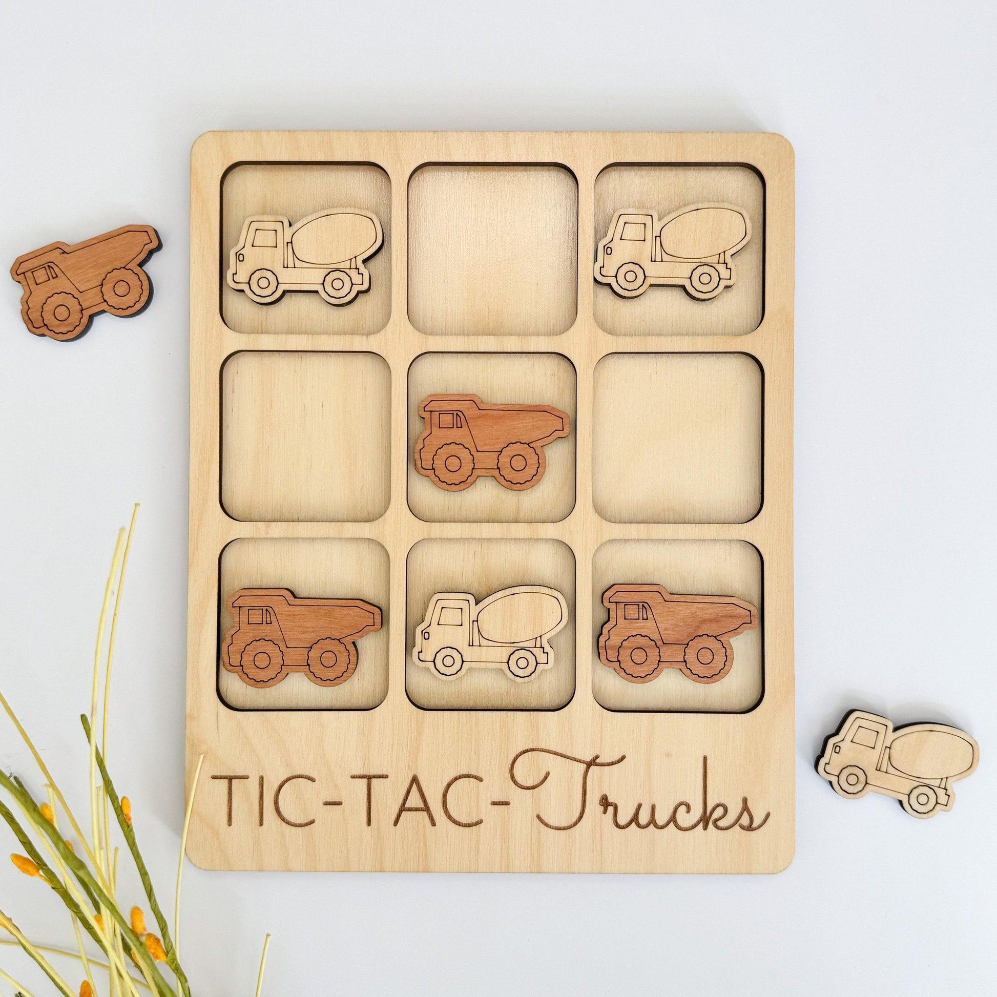 a wooden puzzle with cars and trucks on it