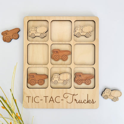 a wooden puzzle with cars and trucks on it