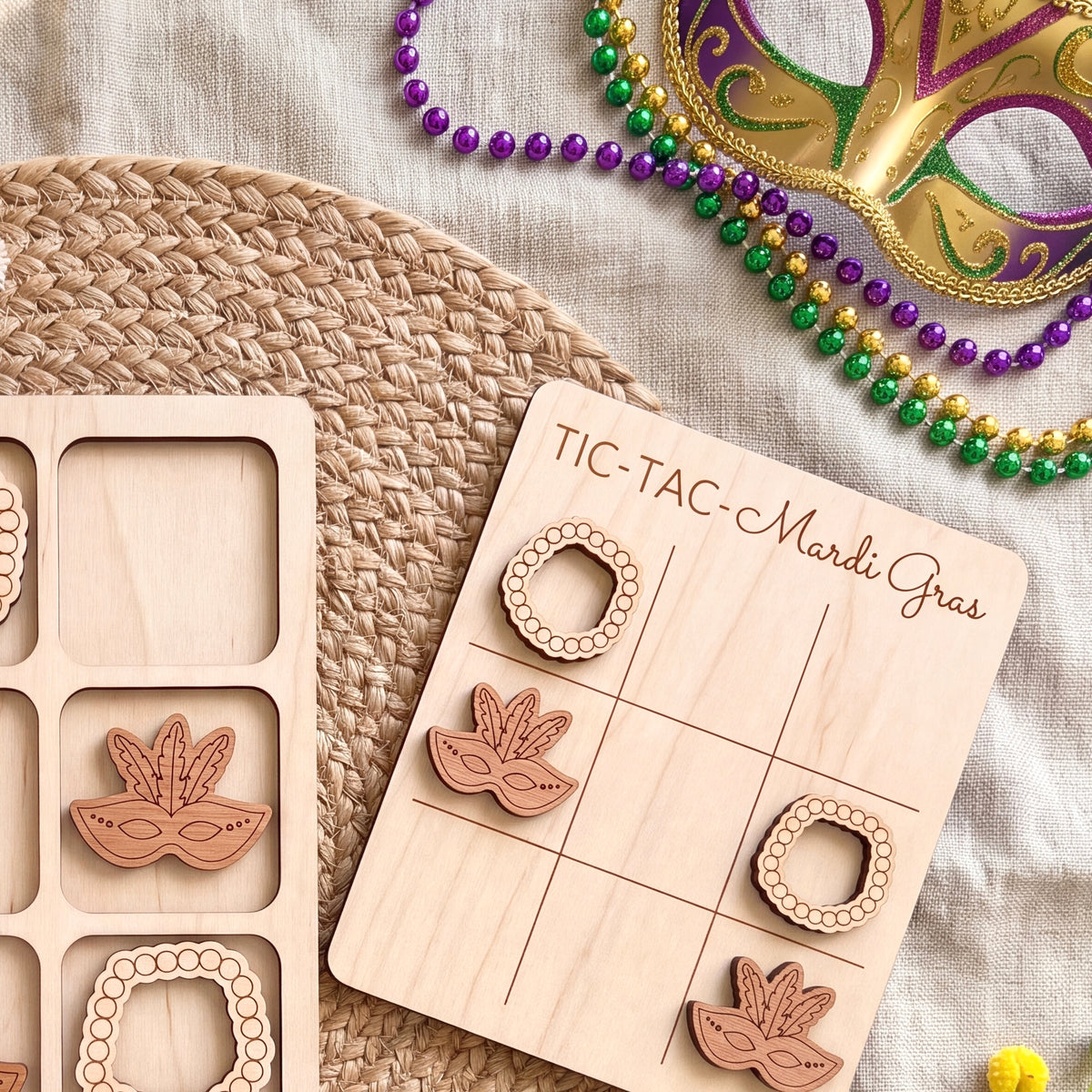 a wooden tic-tac game with masks and beads, suggesting a festive or celebratory theme.