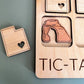 a picture of a wooden magnet with a heart on it