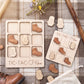 a wooden tic-tac-toe game with wooden pieces shaped like hiking boots, placed on a plaid cloth. There are also some wooden objects, such as a pair of boots, scattered around the game.