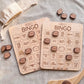 two wooden bingo cards with various hockey-related words and phrases printed on them, along with some wooden bingo pieces scattered around.
