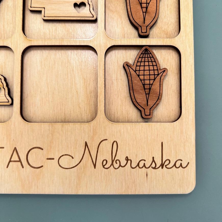 a wooden magnet board with magnets on it