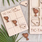 a wooden tic-tac game with a South Carolina theme, including a wooden tic-tac board and various wooden pieces shaped like states in South Carolina.
