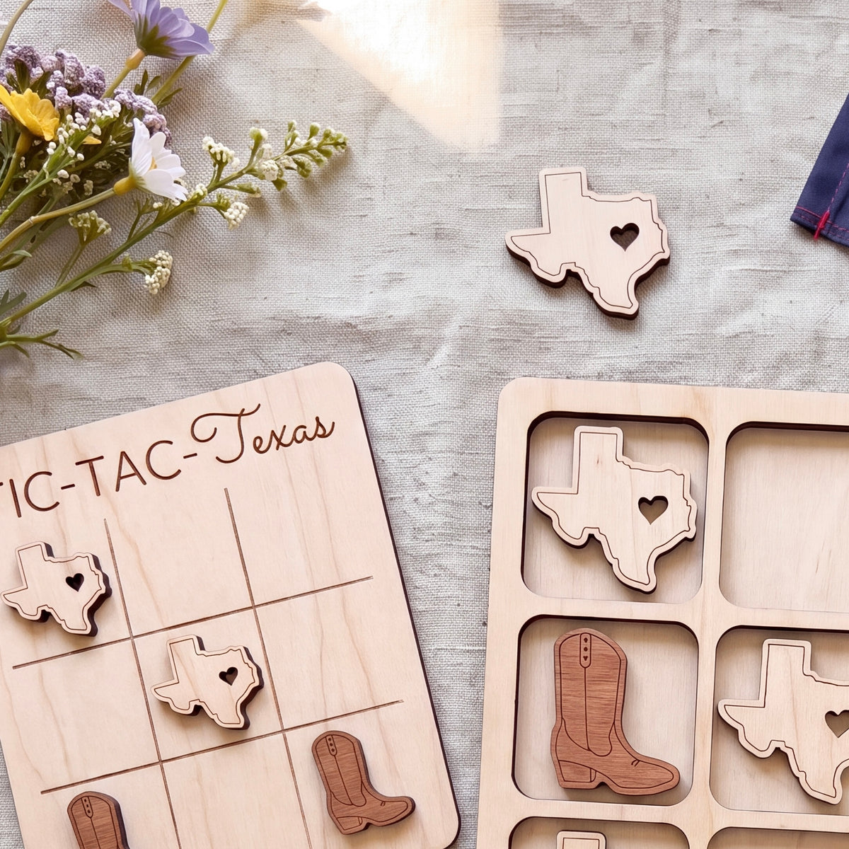 a wooden tic-tac-toe game with a Texas state shape on the board and wooden boot shapes on the game pieces.