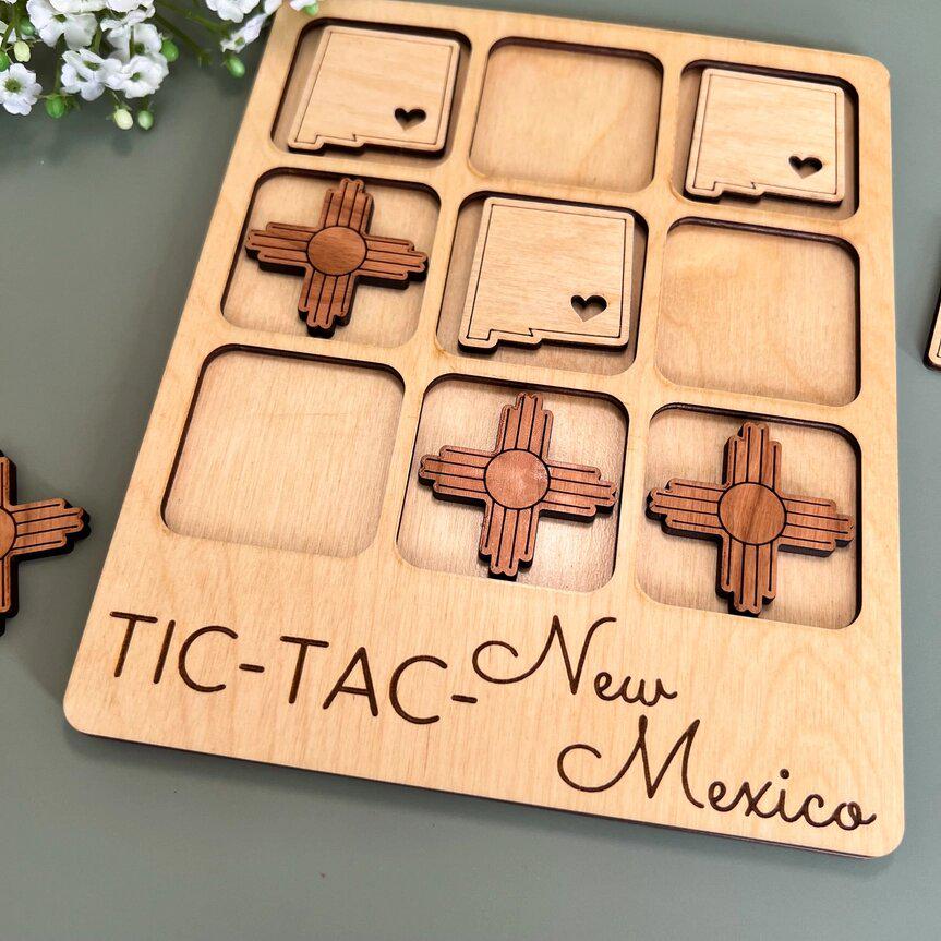 a close up of a wooden puzzle on a table