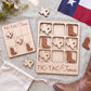 a wooden Tic-Tac-Texas game board with wooden tiles shaped like Texas state icons, along with a pair of brown boots and a Texas flag.