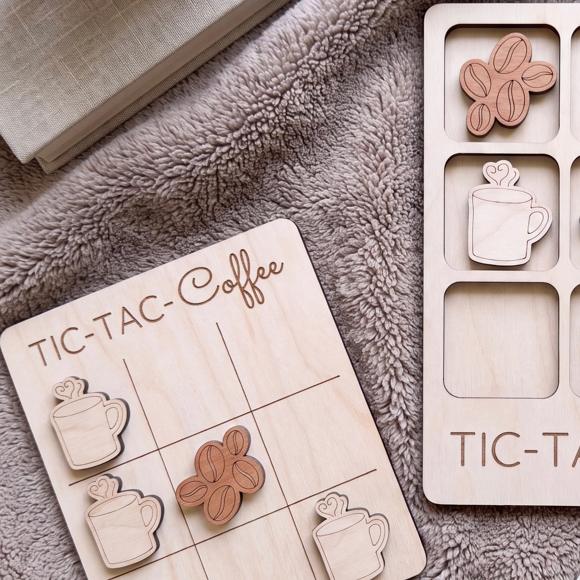a wooden tic-tac game with coffee-themed tiles and wooden coffee cups, as well as a wooden tic-tac card with coffee-themed tiles and wooden coffee cups.
