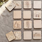 a collection of wooden coasters featuring various designs, including a football, a plant, a building, an oil pump, a star, a taco, and a flower.