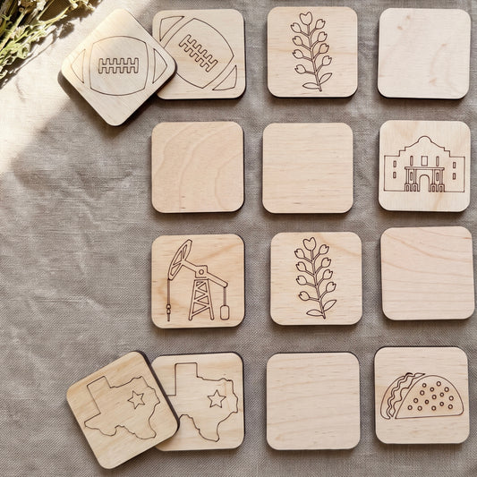 a collection of wooden coasters featuring various designs, including a football, a plant, a building, an oil pump, a star, a taco, and a flower.