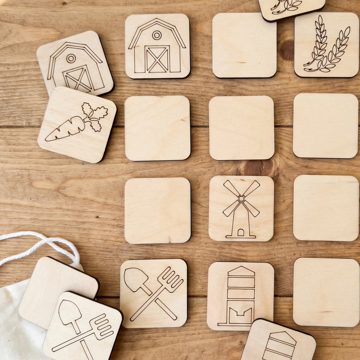 a collection of wooden puzzle pieces with various farm-themed illustrations, including a barn, carrot, windmill, and other farm-related icons.