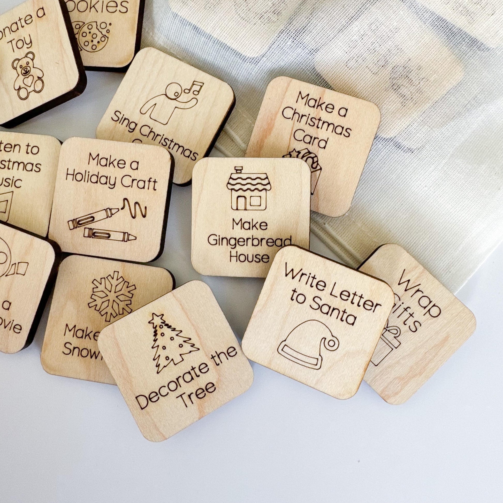 a bunch of wooden magnets with words on them