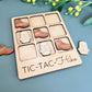 a wooden puzzle with a picture of a pair of shoes