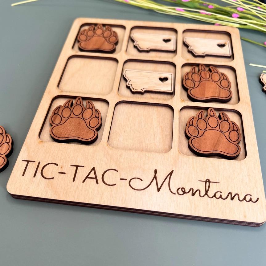 a close up of a tray of food with paw prints on it