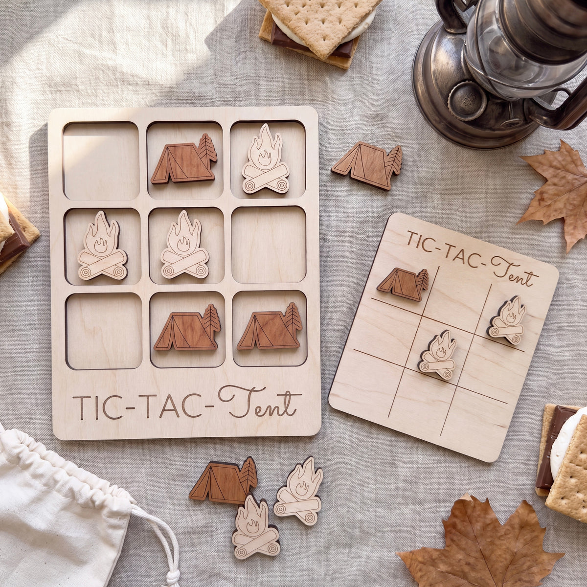 a wooden game board and various wooden game pieces, including tic-tacs, arranged on a table.