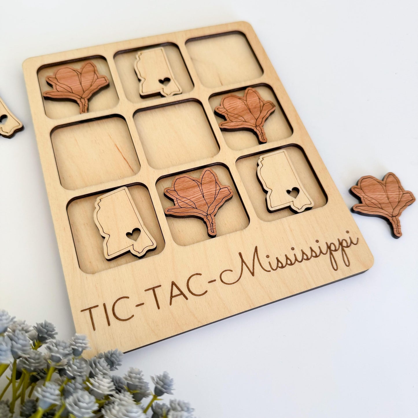 a wooden puzzle with a picture of a woman's face