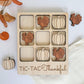 a wooden thanksgiving puzzle with turkeys and pumpkins