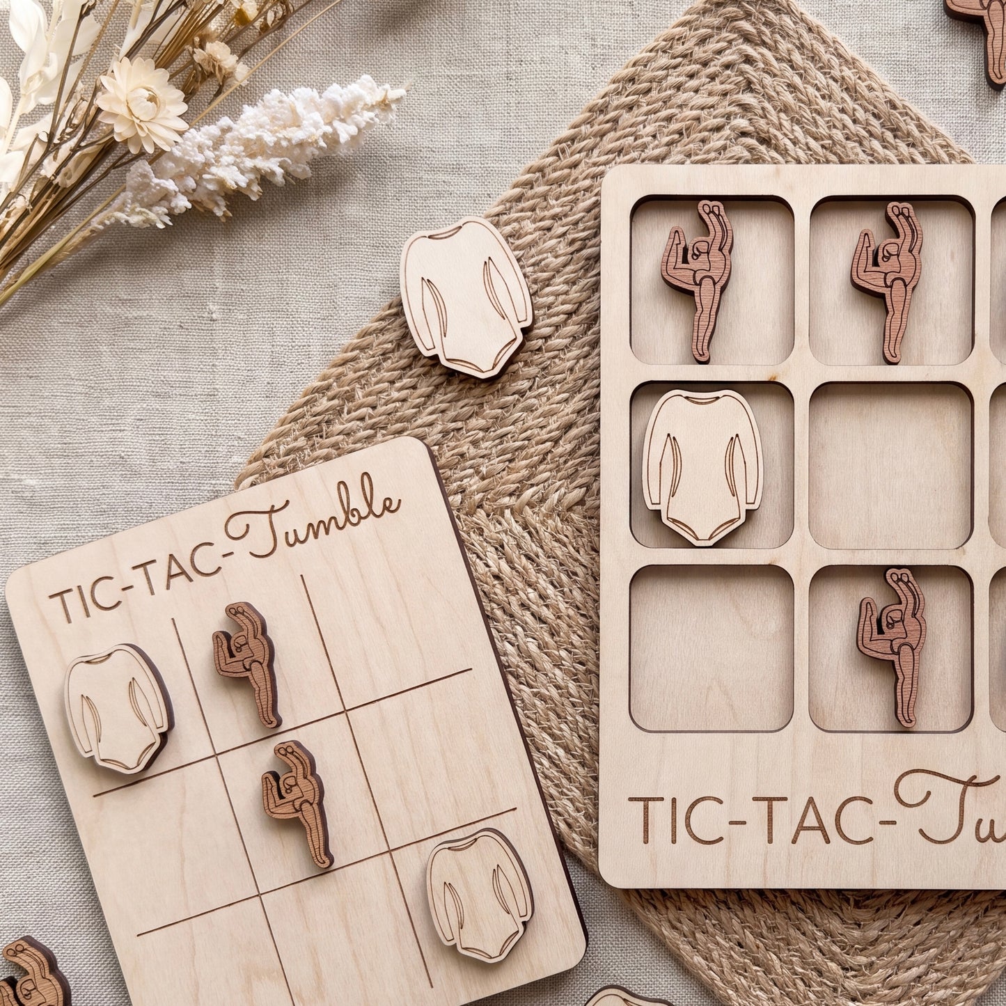 a wooden tic-tac game with a light wood texture and a woven placemat. The game has a grid with wooden pieces and a wooden board with wooden pieces. There are also some wooden pieces on a woven placemat.