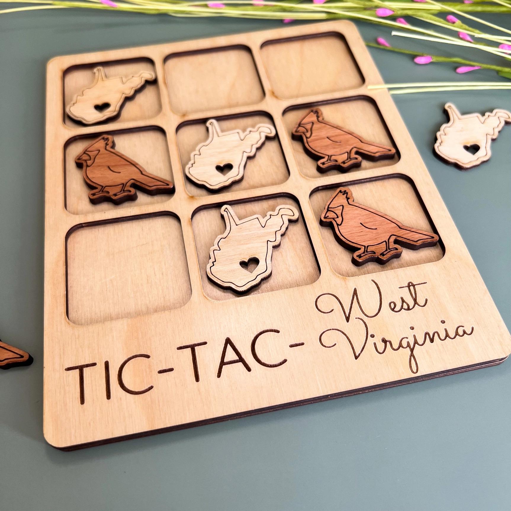 a wooden tray with a bunch of magnets on it